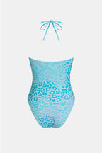 Maillot de bain une pièce bleu bas échancré bretelles licou